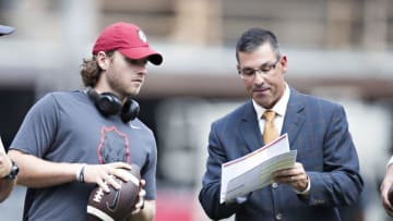 FAYETTEVILLE, AR - SEPTEMBER 9: Offensive Coordinator Dan Enos talks on the field before a game with Austin Allen #8 of the Arkansas Razorbacks before a game against the TCU Horned Frogs at Donald W. Reynolds Razorback Stadium on September 9, 2017 in Fayetteville, Arkansas. (Photo by Wesley Hitt/Getty Images)