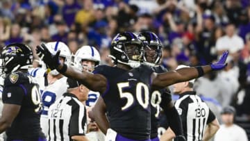 Oct 11, 2021; Baltimore, Maryland, USA; Baltimore Ravens outside linebacker Justin Houston (50) celebrates after sacking Indianapolis Colts quarterback Carson Wentz (2) during the second half at M&T Bank Stadium. Mandatory Credit: Tommy Gilligan-USA TODAY Sports