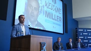Rhode Island Governor Dan McKee, University of Rhode Island President Marc Parlange and Director of Athletics Thorr Bjorn listening to new University of RI MenÕs Basketball coach Archie Miller as he introduces himself to the URI community at the URI Welcome Center on March 21, 2022.