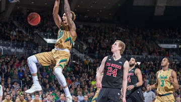 Mar 5, 2016; South Bend, IN, USA; Notre Dame Fighting Irish forward Zach Auguste (30) dunks against North Carolina State Wolfpack guard Maverick Rowan (24) in the second half at the Purcell Pavilion. Notre Dame won 89-75. Mandatory Credit: Matt Cashore-USA TODAY Sports