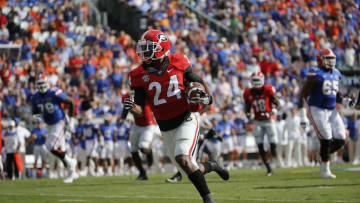 Oct 29, 2016; Jacksonville, FL, USA; Georgia Bulldogs safety Dominick Sanders (24) intercepts the ball during the first quarter against the Florida Gators at EverBank Field. Mandatory Credit: Kim Klement-USA TODAY Sports