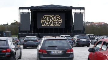 AARHUS, DENMARK - APRIL 25: Visitors watch Star Wars episode IX "The Rise of Skywalker" film in a drive-in cinema, organised by P Scenen on April 25, 2020 in Aarhus, Denmark. Denmark relaxes restrictions imposed to fight coronavirus. The country reported 8445 cases and 418 deaths from Covid-19. The Coronavirus (COVID-19) pandemic has spread to many countries across the world, claiming over 191,000 lives and infecting over 2.7 million people. (Photo by Julien Hekimian/Getty Images)