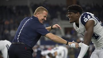 Nov 26, 2015; Arlington, TX, USA; Dallas Cowboys head coach Jason Garrett and defensive end Randy Gregory (94) before the game against the Carolina Panthers on Thanksgiving at AT&T Stadium. Mandatory Credit: Jerome Miron-USA TODAY Sports