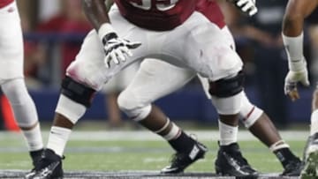 Sep 26, 2015; Arlington, TX, USA; Arkansas Razorbacks tackle Denver Kirkland (55) in action against the Texas A&M Aggies at AT&T Stadium. Mandatory Credit: Matthew Emmons-USA TODAY Sports