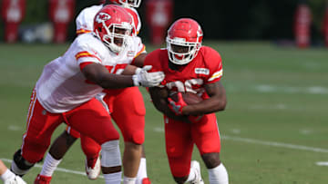 ST. JOSEPH, MO - AUGUST 05: Kansas City Chiefs running back Damien Williams (26) evades a tackle during a run during training camp on August 5, 2018 at Missouri Western State University in St. Joseph, MO. (Photo by Scott Winters/Icon Sportswire via Getty Images)