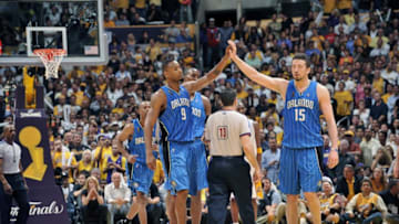 LOS ANGELES - JUNE 7: Rashard Lewis #9 and Hedo Turkoglu #15 of the Orlando Magic high five during Game Two of the 2009 NBA Finals against the Los Angeles Lakers at Staples Center on June 7, 2009 in Los Angeles, California. NOTE TO USER: User expressly acknowledges and agrees that, by downloading and/or using this Photograph, user is consenting to the terms and conditions of the Getty Images License Agreement. Mandatory Copyright Notice: Copyright 2009 NBAE (Photo by Jesse D. Garrabrant/NBAE via Getty Images)
