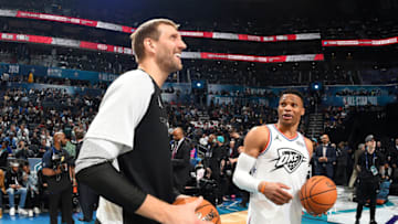 CHARLOTTE, NC - FEBRUARY 17: Dirk Nowitzki #41 and Russell Westbrook #0 of Team Giannis warm up before the 2019 NBA All-Star Game on February 17, 2019 at the Spectrum Center in Charlotte, North Carolina. NOTE TO USER: User expressly acknowledges and agrees that, by downloading and/or using this photograph, user is consenting to the terms and conditions of the Getty Images License Agreement. Mandatory Copyright Notice: Copyright 2019 NBAE (Photo by Andrew D. Bernstein/NBAE via Getty Images)