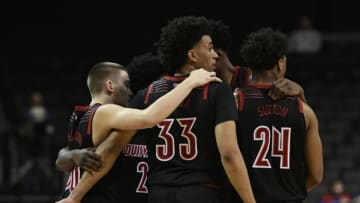NEW YORK, NEW YORK - NOVEMBER 21: The Louisville Cardinals huddle late in the second half of the game against Tennessee Volunteers during the NIT Season Tip-Off tournament at Barclays Center on November 21, 2018 in the Brooklyn borough of New York City. (Photo by Sarah Stier/Getty Images)