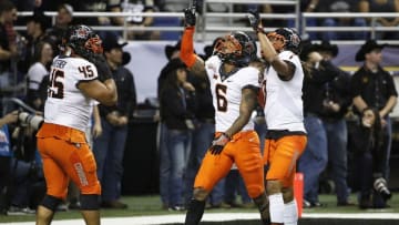 Dec 29, 2016; San Antonio, TX, USA; Oklahoma State Cowboys corner back Ashton Lampkin (6) celebrates with teammates after his interception against the Colorado Buffaloes during the first half at Alamodome. Mandatory Credit: Soobum Im-USA TODAY Sports