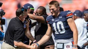 Auburn Tigers quarterback Bo Nix (10) celebrates after the game at Jordan-Hare Stadium in Auburn, Ala., on Saturday, Sept. 11, 2021. Auburn Tigers defeated Alabama State Hornets 60-0.