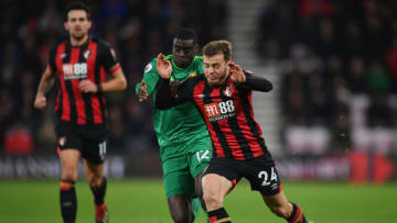 BOURNEMOUTH, ENGLAND - JANUARY 02: Ryan Fraser of AFC Bournemouth holds off Ken Sema of Watford during the Premier League match between AFC Bournemouth and Watford FC at Vitality Stadium on January 2, 2019 in Bournemouth, United Kingdom. (Photo by Dan Mullan/Getty Images)