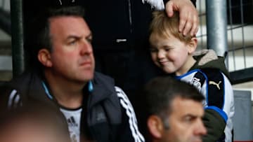 SOUTHAMPTON, UNITED KINGDOM - APRIL 09: A young Newcastle United supporter shows his dejection after his team's 1-3 defeat in the Barclays Premier League match between Southampton and Newcastle United at St Mary's Stadium on April 9, 2016 in Southampton, England. (Photo by Christopher Lee/Getty Images)