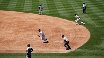 DENVER, CO - AUGUST 05: The Colorado Rockies infield employ the infield shift as they defend against the Seattle Mariners during interleague play at Coors Field on August 5, 2015 in Denver, Colorado. The Rockies defeated the Mariners 7-5 in 11 innings. (Photo by Doug Pensinger/Getty Images)