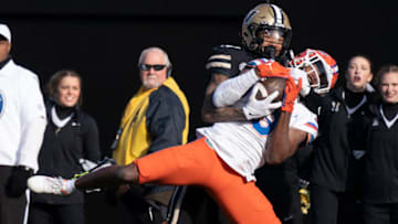 Nov 19, 2022; Nashville, Tennessee, USA; Florida cornerback Jason Marshall Jr. (3) pulls in an interception over Vanderbilt wide receiver Will Sheppard (14) during the fourth quarter at FirstBank Stadium.Mandatory Credit: George Walker IV - USA TODAY Sports
