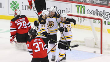 Jan 14, 2021; Newark, New Jersey, USA; The Boston Bruins celebrate a goal by Boston Bruins left wing Nick Ritchie (21) during the third period of their game against the New Jersey Devils at Prudential Center. Mandatory Credit: Ed Mulholland-USA TODAY Sports