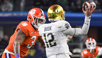 Clemson defensive lineman Xavier Thomas (3) pressures Notre Dame quarterback Ian Book (12) during the fourth quarter of the College Football Playoff Semifinal at the Goodyear Cotton Bowl Classic at AT&T Stadium in Arlington, Texas Saturday, December 29, 2018.Clemson Beats Notre Dame