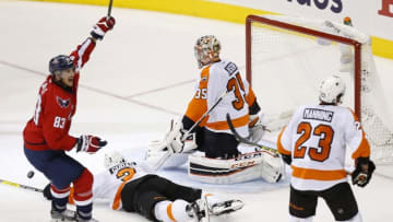 Apr 14, 2016; Washington, DC, USA; Washington Capitals center Jay Beagle (83) celebrates after scoring a goal on Philadelphia Flyers goalie Steve Mason (35) in the third period in game one of the first round of the 2016 Stanley Cup Playoffs at Verizon Center. The Capitals won 2-0, and lead the series 1-0. Mandatory Credit: Geoff Burke-USA TODAY Sports