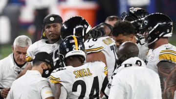 EAST RUTHERFORD, NEW JERSEY - SEPTEMBER 14: Zach Banner #72 of the Pittsburgh Steelers is lifted up by his teammates after sustaining an injury during the second half against the New York Giants at MetLife Stadium on September 14, 2020 in East Rutherford, New Jersey. (Photo by Sarah Stier/Getty Images)