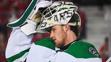 CALGARY, AB - MAY 15: Jake Oettinger #29 of the Dallas Stars in action against the Calgary Flames during Game Seven of the First Round of the 2022 Stanley Cup Playoffs at Scotiabank Saddledome on May 15, 2022 in Calgary, Alberta, Canada. The Flames defeated the Stars 3-2 in overtime. (Photo by Derek Leung/Getty Images)