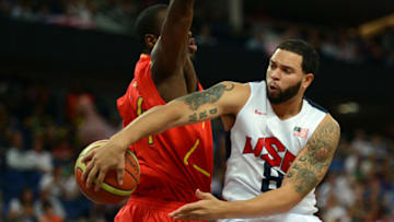 US guard Deron Williams passes the ball during the London 2012 Olympic Games men's gold medal basketball game between USA and Spain at the North Greenwich Arena in London on August 12, 2012. AFP PHOTO / TIMOTHY A. CLARY (Photo credit should read TIMOTHY A. CLARY/AFP/GettyImages)