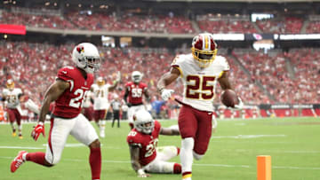 GLENDALE, AZ - SEPTEMBER 09: Running back Chris Thompson #25 of the Washington Redskins runs for a 13-yard touchdown during the second quarter against the Arizona Cardinals at State Farm Stadium on September 9, 2018 in Glendale, Arizona. (Photo by Christian Petersen/Getty Images)