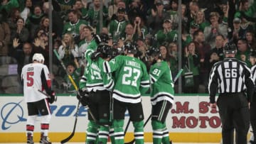 DALLAS, TX - NOVEMBER 23: Mattias Janmark #13, Esa Lindell #23, Tyler Seguin #91 of the Dallas Stars celebrate a goal against the Ottawa Senators at the American Airlines Center on November 23, 2018 in Dallas, Texas. (Photo by Glenn James/NHLI via Getty Images)
