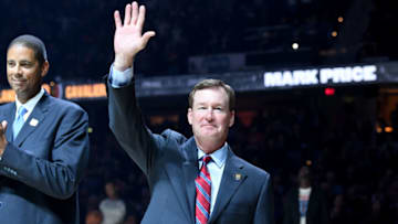 CLEVELAND, OHIO - OCTOBER 26: Former Cavaliers greats Brad Daugherty, left, and Mark Price, right, wave to the crowd during a celebration for the Cavaliers 50th anniversary prior to the game against the Indiana Pacers at Rocket Mortgage Fieldhouse on October 26, 2019 in Cleveland, Ohio. NOTE TO USER: User expressly acknowledges and agrees that, by downloading and/or using this photograph, user is consenting to the terms and conditions of the Getty Images License Agreement. (Photo by Jason Miller/Getty Images)