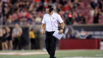 Louisville Cardinals head coach Scott Satterfield watches against the Notre Dame Fighting Irish. Getty Images.