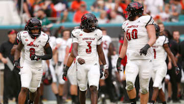 MIAMI, FLORIDA - NOVEMBER 09: Micale Cunningham #3 of the Louisville Cardinals looks on against the Miami Hurricanes during the first half at Hard Rock Stadium on November 09, 2019 in Miami, Florida. (Photo by Michael Reaves/Getty Images)
