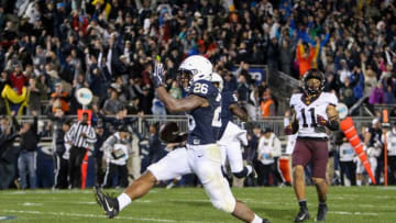 Oct 1, 2016; University Park, PA, USA; Penn State Nittany Lions running back Saquon Barkley (26) runs the ball into the end zone for a touchdown in overtime against the Minnesota Golden Gophers at Beaver Stadium. Penn State defeated Minnesota 29-26 in overtime. Mandatory Credit: Matthew O