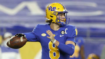 Nov 21, 2020; Pittsburgh, Pennsylvania, USA; Pittsburgh Panthers quarterback Kenny Pickett (8) passes against the Virginia Tech Hokies during the second quarter at Heinz Field. Mandatory Credit: Charles LeClaire-USA TODAY Sports