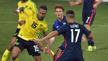 Jamaica's defender Liam Moore (L) and United States national team's Sebastian Lletget. (Photo by JAKUB SUKUP / AFP) (Photo by JAKUB SUKUP/AFP via Getty Images)