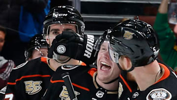 ANAHEIM, CA - MARCH 8: Korbinian Holzer #5 of the Anaheim Ducks congratulates Max Jones #49 following his first NHL goal in the third period of the game against the Montreal Canadiens on March 8, 2019 at Honda Center in Anaheim, California. (Photo by Debora Robinson/NHLI via Getty Images)