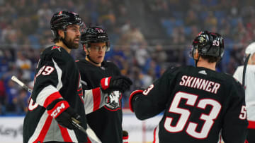 BUFFALO, NY - APRIL 13: Henri Jokiharju #10 of the Buffalo Sabres celebrates after scoring a goal with Alex Tuch #89 and Jeff Skinner #53 during the second period against the Ottawa Senators at KeyBank Center on April 13, 2023 in Buffalo, New York. (Photo by Kevin Hoffman/Getty Images)