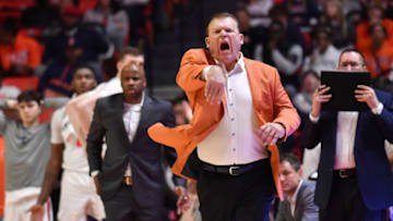 Dec 29, 2022; Champaign, Illinois, USA; Illinois Fighting Illini head coach Brad Underwood reacts off the bench during the second half against the Bethune-Cookman Wildcats at State Farm Center. Mandatory Credit: Ron Johnson-USA TODAY Sports