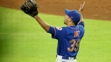 May 18, 2021; Atlanta, Georgia, USA; New York Mets relief pitcher Edwin Diaz (39) reacts after the final out during the ninth inning against the Atlanta Braves at Truist Park. Mandatory Credit: Jason Getz-USA TODAY Sports