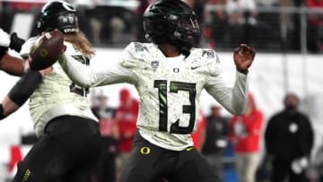 Dec 3, 2021; Las Vegas, NV, USA; Oregon Ducks quarterback Anthony Brown (13) throws the ball against the Utah Utes in the second half during the 2021 Pac-12 Championship Game at Allegiant Stadium.Utah defeated Oregon 38-10. Mandatory Credit: Kirby Lee-USA TODAY Sports