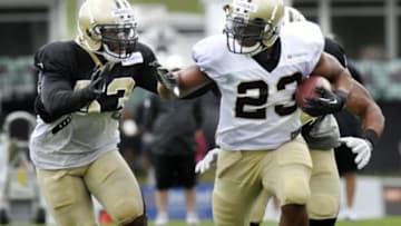 Jul 28, 2014; White Sulpher Springs, WV, USA; New Orleans Saints running back Pierre Thomas (23) carries the ball during training camp at The Greenbrier. Mandatory Credit: Michael Shroyer-USA TODAY Sports