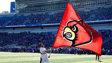 LEXINGTON, KY - NOVEMBER 25: A Louisville Cardinals cheerleader waves a flag during the game against the Kentucky Wildcats at Commonwealth Stadium on November 25, 2017 in Lexington, Kentucky. (Photo by Andy Lyons/Getty Images)
