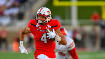 LUBBOCK, TX - SEPTEMBER 15: Antoine Wesley #4 of the Texas Tech Red Raiders breaks free for yards after the catch in the second half during the game against the Houston Cougars on September 15, 2018 at Jones AT&T Stadium in Lubbock, Texas. Texas Tech won the game 63-49. (Photo by John Weast/Getty Images)