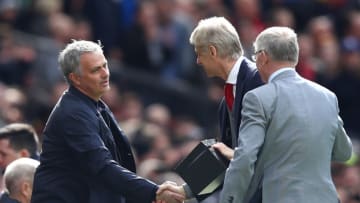 MANCHESTER, ENGLAND - APRIL 29: Sir Alex Ferguson and Jose Mourinho, Manager of Manchester United greet Arsene Wenger, Manager of Arsenal pitchside prior to the Premier League match between Manchester United and Arsenal at Old Trafford on April 29, 2018 in Manchester, England. (Photo by Clive Brunskill/Getty Images)