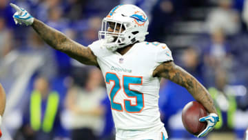 INDIANAPOLIS, IN - NOVEMBER 25: Xavien Howard #25 of the Miami Dolphins celebrates after intercepting a pass in the final minute of the first half against the Indianapolis Colts at Lucas Oil Stadium on November 25, 2018 in Indianapolis, Indiana. (Photo by Andy Lyons/Getty Images)