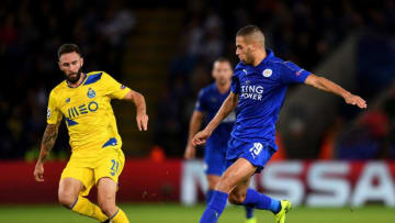 LEICESTER, ENGLAND - SEPTEMBER 27: Islam Slimani of Leicester City takes on Miguel Layun of FC Porto during the UEFA Champions League Group G match between Leicester City FC and FC Porto at The King Power Stadium on September 27, 2016 in Leicester, England. (Photo by Michael Regan/Getty Images)