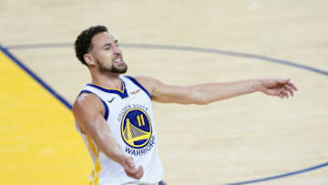 OAKLAND, CALIFORNIA - MAY 14: Klay Thompson #11 of the Golden State Warriors celebrates after dunking the ball during the second half against the Portland Trail Blazers in game one of the NBA Western Conference Finals at ORACLE Arena on May 14, 2019 in Oakland, California. NOTE TO USER: User expressly acknowledges and agrees that, by downloading and or using this photograph, User is consenting to the terms and conditions of the Getty Images License Agreement. (Photo by Thearon W. Henderson/Getty Images)