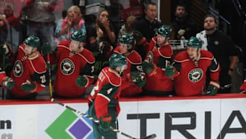 Oct 8, 2016; Saint Paul, MN, USA; The Minnesota Wild celebrate a goal by defenseman Mike Reilly (4) during the third period against the Winnipeg Jets at Xcel Energy Center. The Wild won 5-1. Mandatory Credit: Marilyn Indahl-USA TODAY Sports