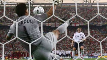 Portuguese goalkeeper Ricardo saves a penalty kicks of English midfielder Steven Gerrard (R) during the penalty kicks of the World Cup 2006 quarter final football game England vs. Portugal, 01 July 2006 at Gelsenkirchen stadium. Portugal won 3-1 on penalties. AFP PHOTO / ARIS MESSINIS (Photo credit should read ARIS MESSINIS/AFP/Getty Images)