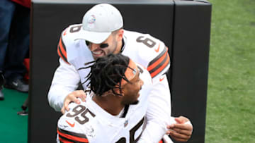 CINCINNATI, OHIO - OCTOBER 25: Baker Mayfield #6 and Myles Garrett #95 of the Cleveland Browns celebrate the teams 37-34 victory against the Cincinnati Bengals at Paul Brown Stadium on October 25, 2020 in Cincinnati, Ohio. (Photo by Andy Lyons/Getty Images)