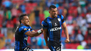 QUERETARO, MEXICO - NOVEMBER 24: Miguel Samudio of Queretaro celebrates after scoring the first goal of his team during the 17th round match between Queretaro and Necaxa as part of the Torneo Apertura 2018 Liga MX at La Corregidora Stadium on November 24, 2018 in Queretaro, Mexico. (Photo by Cesar Gomez/Jam Media/Getty Images)
