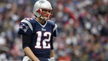 Dec 28, 2014; Foxborough, MA, USA; New England Patriots quarterback Tom Brady (12) makes is way to the sideline as they take on the Buffalo Bills in the second quarter at Gillette Stadium. Mandatory Credit: David Butler II-USA TODAY Sports