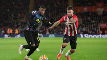 SOUTHAMPTON, ENGLAND - DECEMBER 28: Adam Armstrong of Southampton and Emerson Royal of Tottenham Hotspur during the Premier League match between Southampton and Tottenham Hotspur at St Mary's Stadium on December 28, 2021 in Southampton, England. (Photo by Visionhaus/Getty Images)